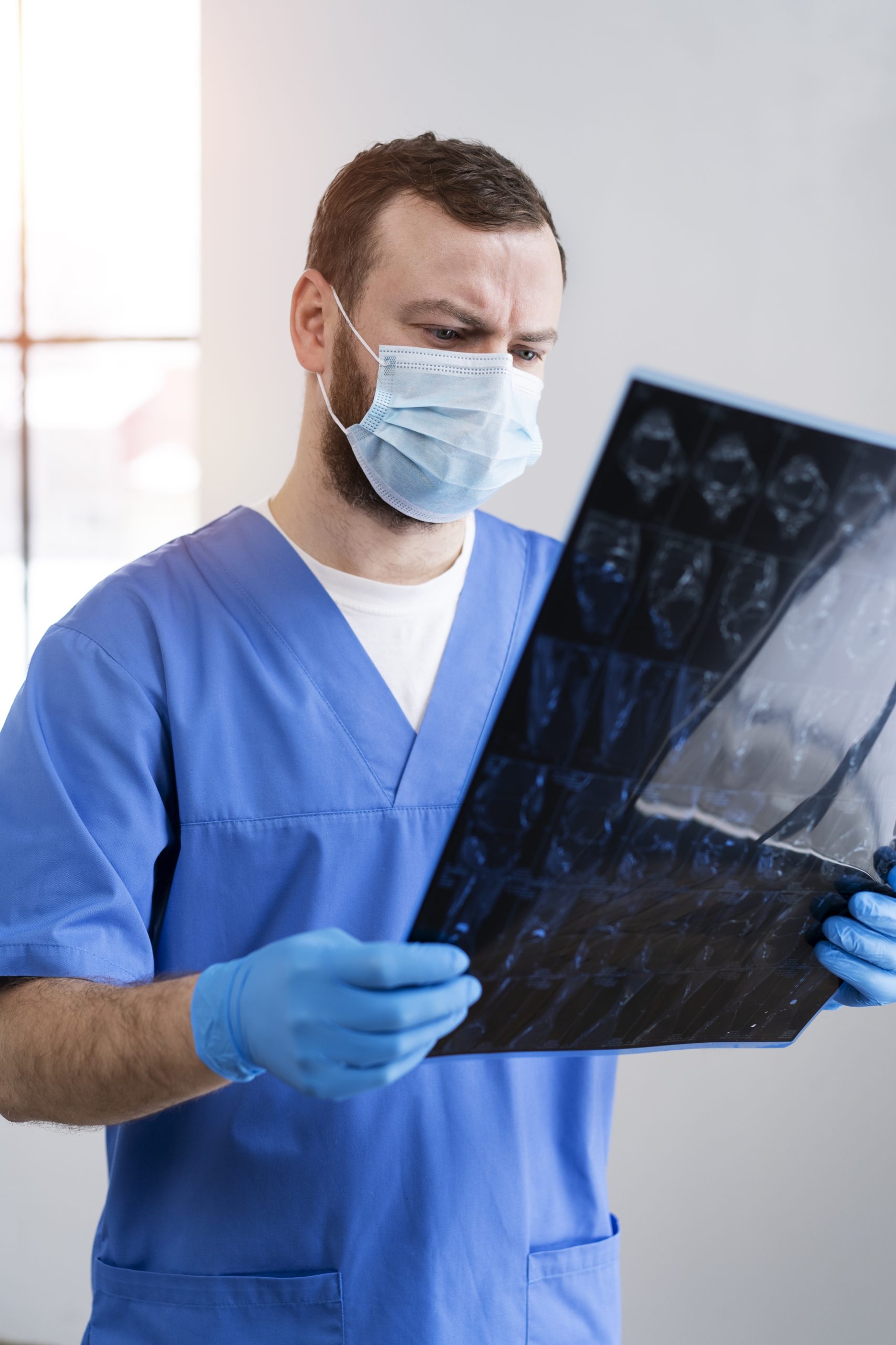 nurse-looking-radiography-medium-shot